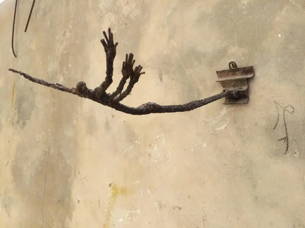 N’dary Lo’s three figures in flight formed from welded reinforcing steel.
