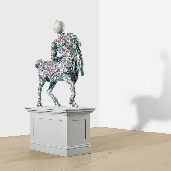 Yinka Shonibare’s patterned centaur sculpture on a white pedestal.